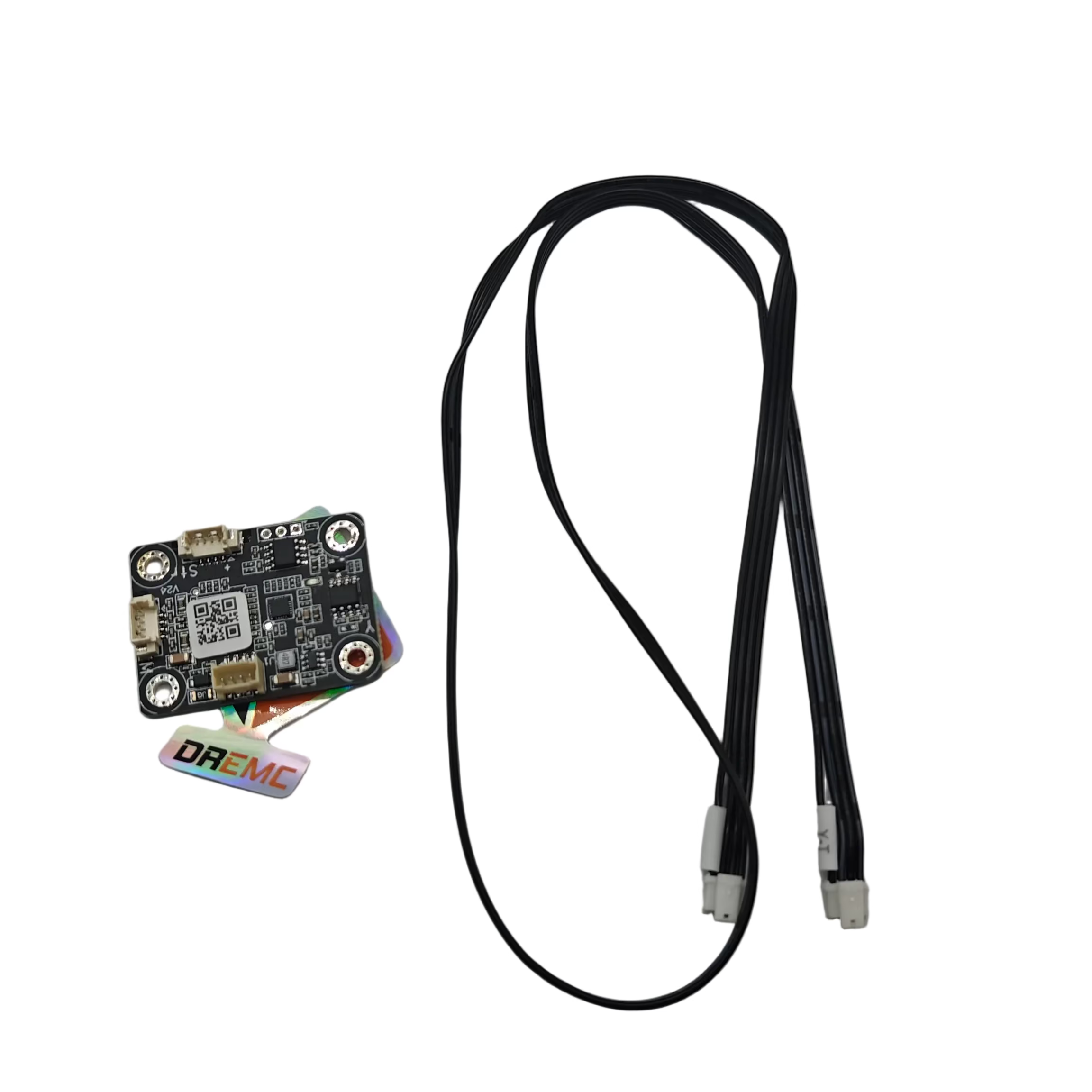 A small electronic circuit board with a short white ribbon cable next to a long black multi-connector cable on a light gray surface.