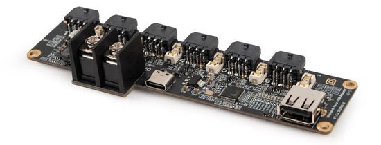 Electronic circuit board with connectors on a white background