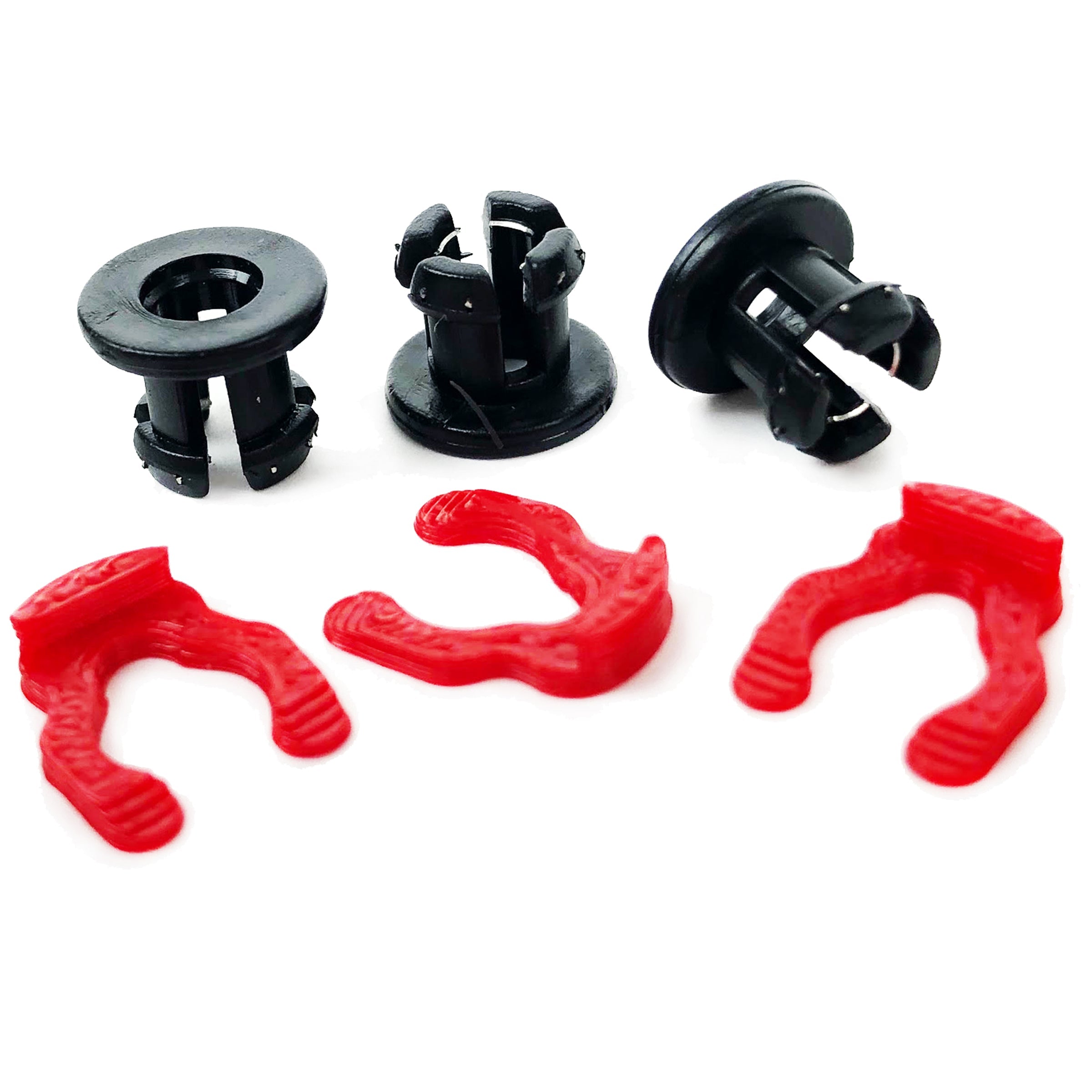 Set of black and red plastic clips on a white background