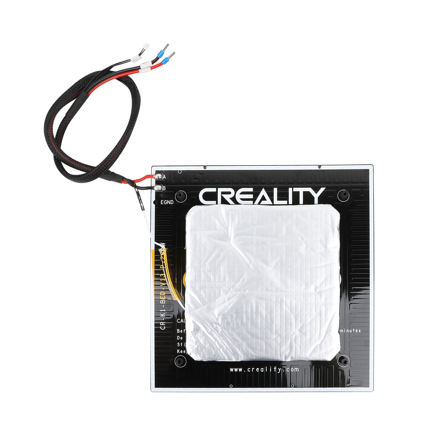 A heated bed kit for a Creality K1 3D printer, including a black aluminium plate with wires attached, with the Creality logo visible.