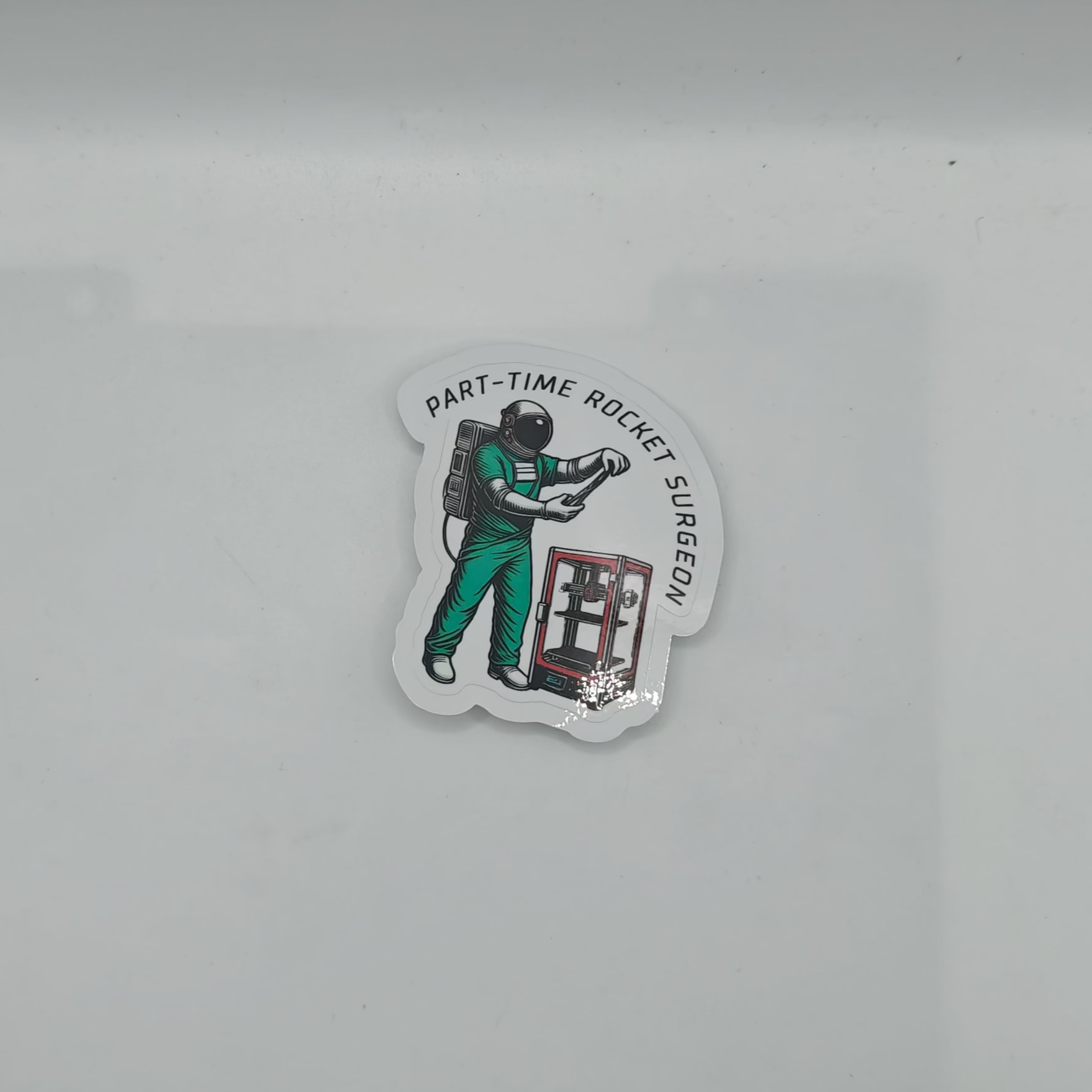 Sticker of a person with a tool on a gray background