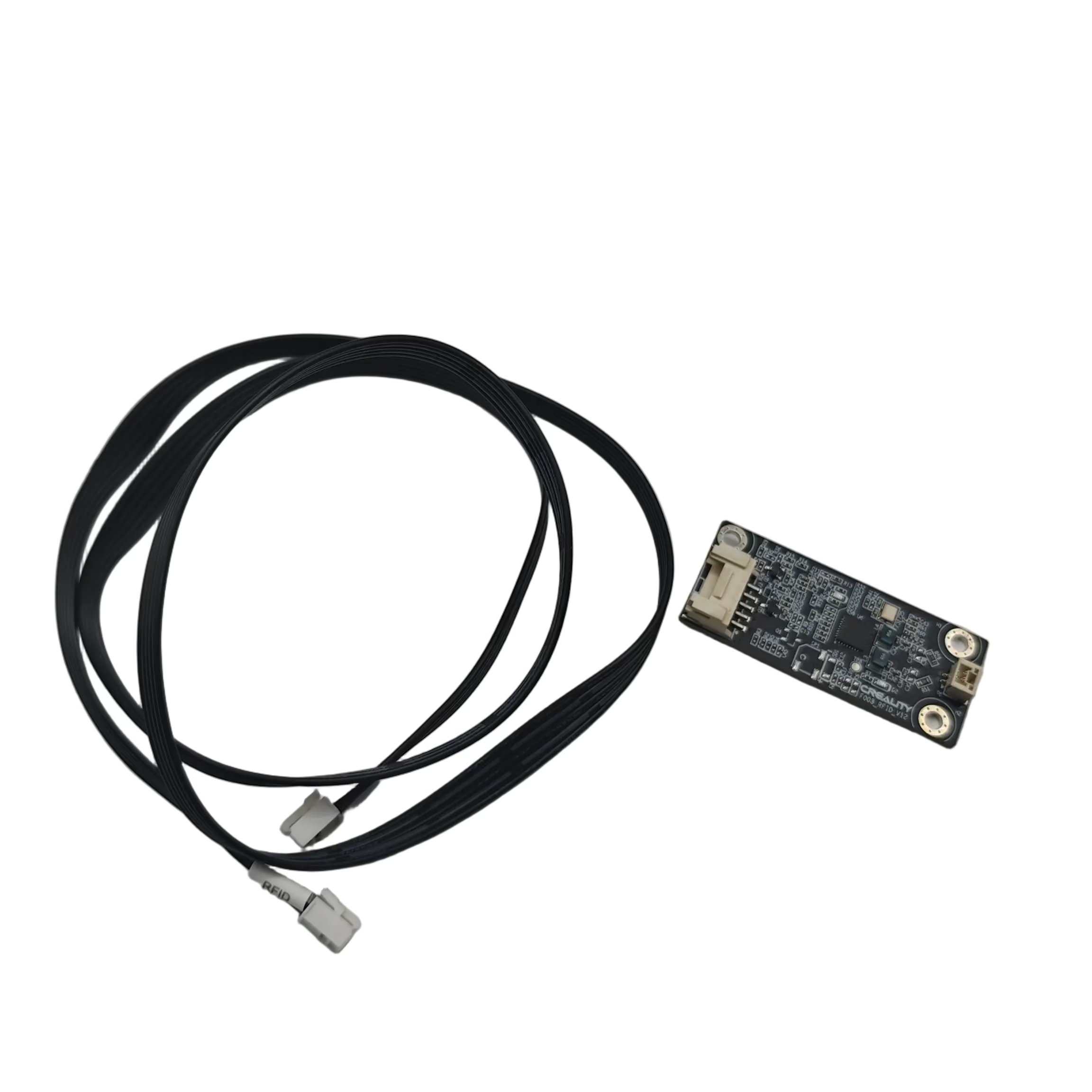 A small electronic circuit board with a black cable attached, photographed on a plain light gray surface.