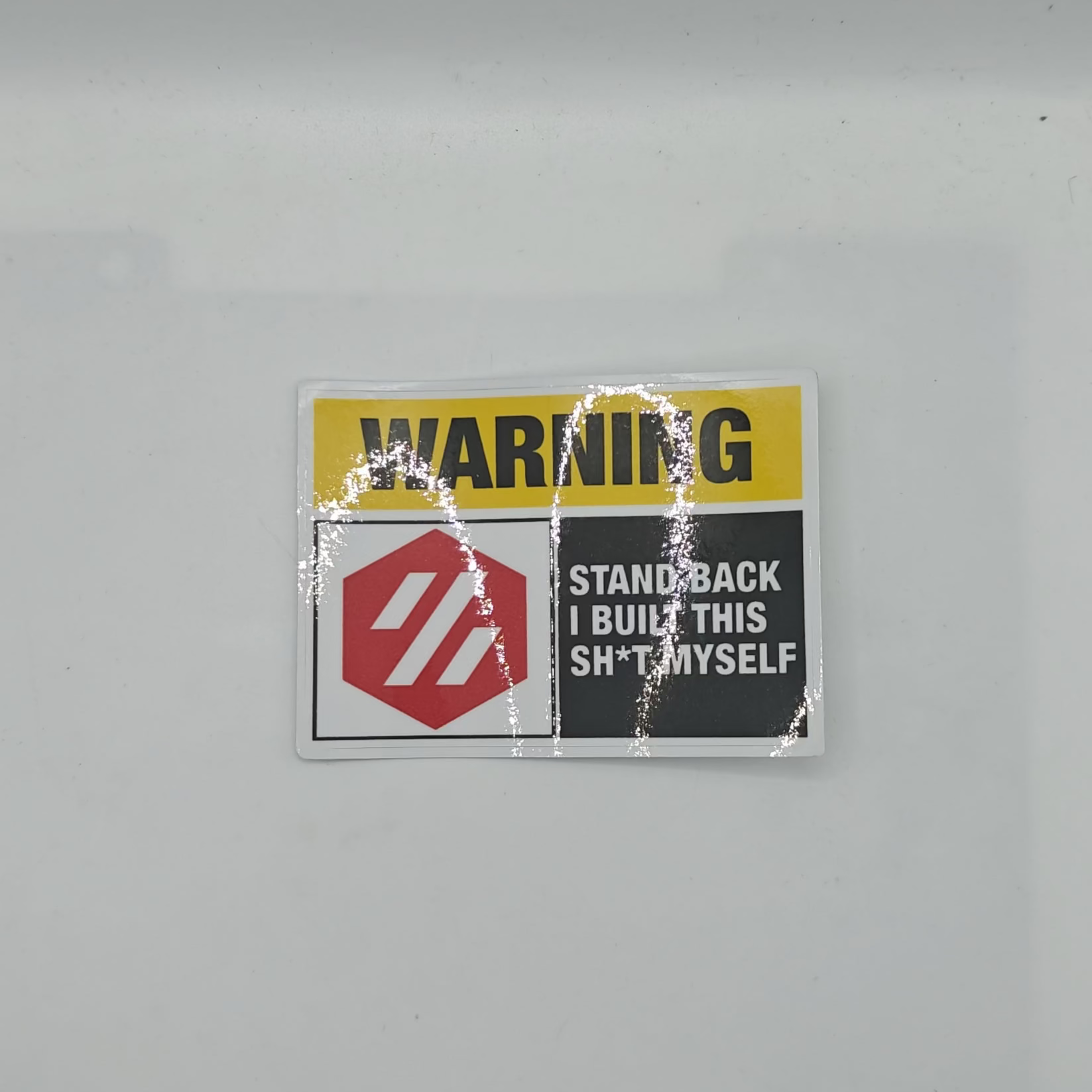 Warning sticker on a white background