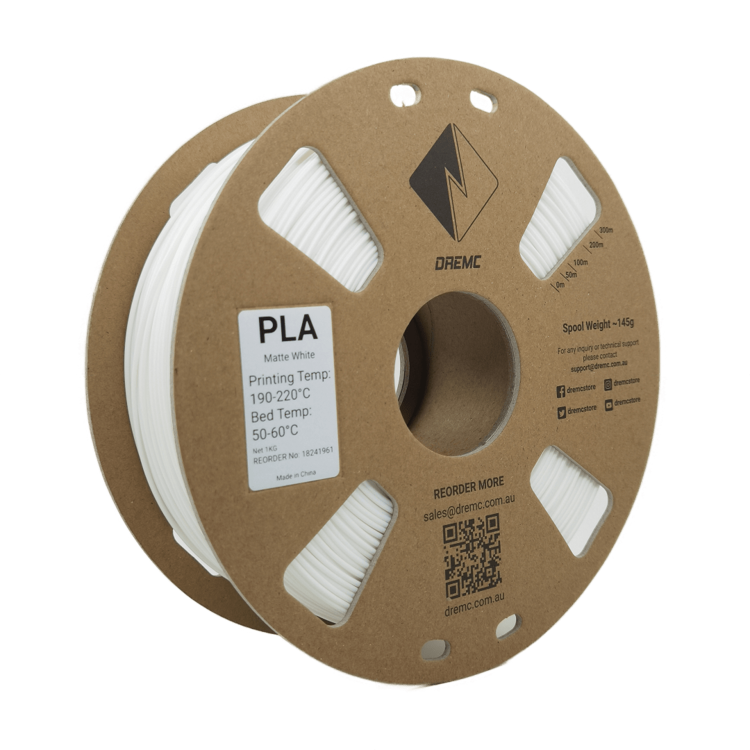 A spool of DREMC Matte PLA Filament 1.75mm 1kg, primarily white in color, packaged on a cardboard spool with branding and product information.