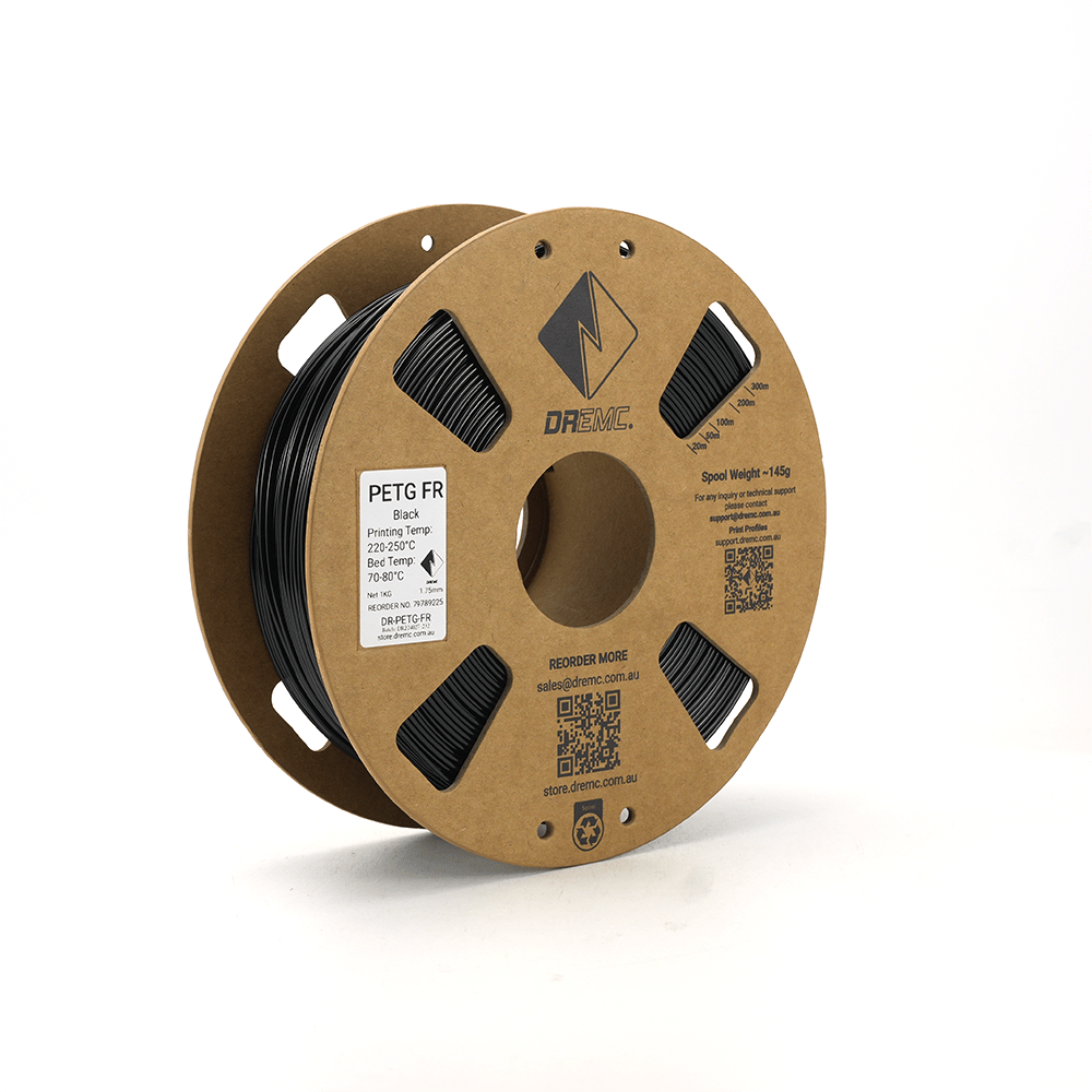Spool of 3D printing filament with DREMC branding on a white background