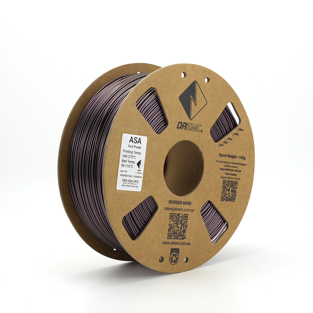 Spool of purple filament on a cardboard reel with DREMC branding on a white background