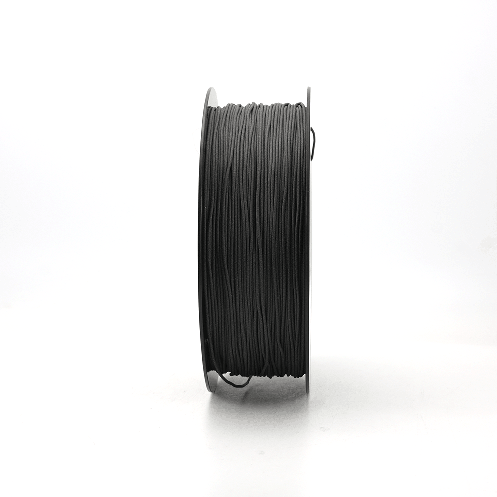 Spool of DREMC TPU Aero filament on a white background