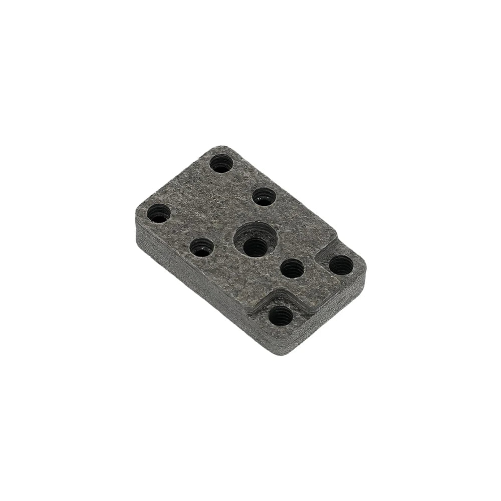 Gray rectangular block with multiple holes on a white background