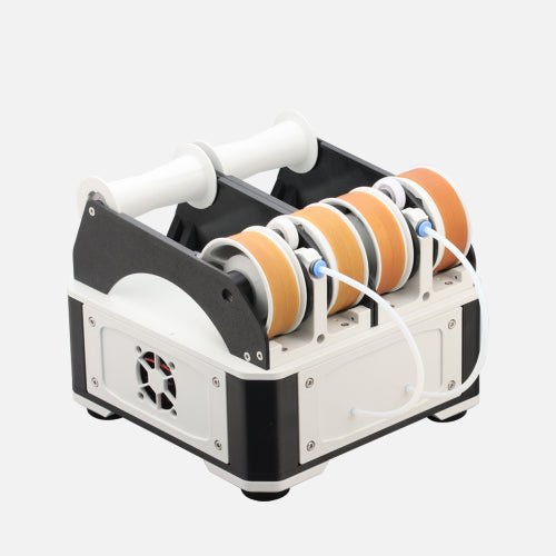 Mechanical device with spools of thread on a white background